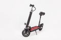 Black electric kick scooter with seat on white background Royalty Free Stock Photo