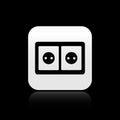 Black Electrical outlet icon isolated on black background. Power socket. Rosette symbol. Silver square button. Vector Royalty Free Stock Photo