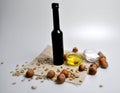 Olive oil, sunflower seeds, nuts and salt Royalty Free Stock Photo