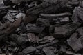 The black embers after burnt campfire closeup Royalty Free Stock Photo