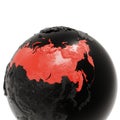 Black Embossed Earth Globe with Eurasia Close-Up. Russia is Highlighted in Red.