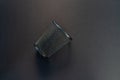 Black Empty Metal Mesh Pen Holder on Black Background Royalty Free Stock Photo