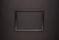 Black on black. Empty black photo frame on black background, top view with copy space for text Royalty Free Stock Photo