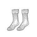 Black engraved textile socks drawing. Man cotton garment for the foot ink hand drawn style vector illustration