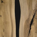 Black epoxy resin panel with walnut Royalty Free Stock Photo