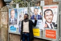 Black ethnicity man showing support to Emmanuel Macron