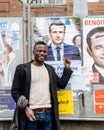 Black ethnicity man showing support to Emmanuel Macron