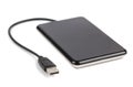 Black external hard disk with cable Royalty Free Stock Photo