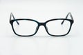 Black eye glasses spectacles with shiny black frame For reading daily life To a person with visual impairment. White background as Royalty Free Stock Photo