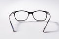 Black eye glasses spectacles with shiny black frame For reading daily life To a person with visual impairment isolaged on white Royalty Free Stock Photo