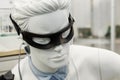 Black eye patch, medical sensors and equipment on mannequin. Modern treatment technologies