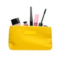 Black eyeliner and other makeup products in cosmetic bag on white, top view Royalty Free Stock Photo