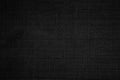 Black fabric canvas texture background. Linen dyed black. Sackcloth woven texture pattern background dark black color pipe from