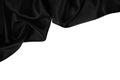 Black fabric drapery isolated on white background. Black silk satin with beautiful wavy folds. Royalty Free Stock Photo