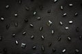 Black fabric for evening dress, embroidered with bugles and paillettes by hand Royalty Free Stock Photo