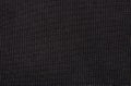 Black fabric texture in a small square cell. Royalty Free Stock Photo