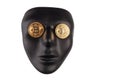 Black face mask with golden bitcoins placed on eyes isolated on white with copy space. Anonymity and cryptocurrency concept. Royalty Free Stock Photo