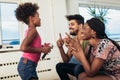 Black family enjoy singing karaoke