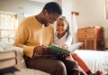 Black family, father reading to child and bonding love, storytelling and language learning in bedroom. Happy people, dad Royalty Free Stock Photo