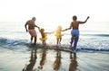 Black family having fun on the beach Royalty Free Stock Photo