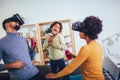 Black family at home. Dad, mom and daughter playing virtual reality