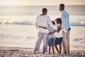 Black family, hug at beach travel and together watching ocean waves and sunset view, freedom with parents and kids. Man Royalty Free Stock Photo