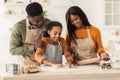 Black Family Kneading Dough Baking Together Making Cookies In Kitchen Royalty Free Stock Photo