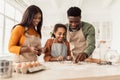 Black Family Making Cookies Using Baking Forms Cooking In Kitchen Royalty Free Stock Photo