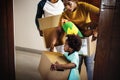 Black family moving in to their new house Royalty Free Stock Photo