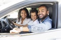 Black family with one child riding car, spending time together Royalty Free Stock Photo