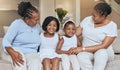 Black family on sofa, children smile with grandmother in living room and portrait in Chicago home. Happy mom loves young Royalty Free Stock Photo