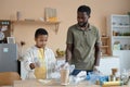 Black Family Sorting Waste Together Royalty Free Stock Photo