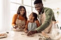 Black Family Using Baking Forms Making Cookies In Kitchen Royalty Free Stock Photo