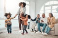 Black family, vacation and mother playing with children in a home in winter and bonding together in a house. Parents Royalty Free Stock Photo