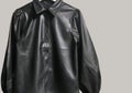 Black faux leather shirt with puff sleeves