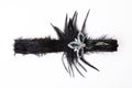 Black feather headband on white Royalty Free Stock Photo