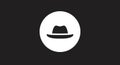 Black fedora hat silhouette centered in a white circle, set against a solid black Royalty Free Stock Photo