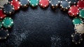 A black felt surface with poker chips scattered around the outside edge of the frame. On a dark black background. T Royalty Free Stock Photo