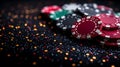 A black felt surface with poker chips scattered around the outside edge of the frame. On a dark black background. T Royalty Free Stock Photo
