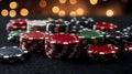 A black felt surface with poker chips scattered around the outside edge of the frame. On a dark black background. T Royalty Free Stock Photo
