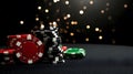 A black felt surface with poker chips scattered around the outside edge of the frame. On a dark black background. T Royalty Free Stock Photo