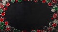 A black felt surface with poker chips scattered around the outside edge of the frame. On a dark black background. T Royalty Free Stock Photo