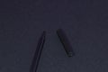 black felt-tip pen on a black background Royalty Free Stock Photo