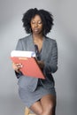 Black Female Business Woman with Contracts or Reports