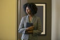 Black African American Female Businesswoman with a Book