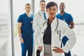 Black female doctor leading medical team Royalty Free Stock Photo