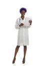 Black Female Doctor Standing With Paper Document Royalty Free Stock Photo