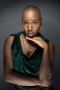 Black Female Fashion Model with Bald Hairstyle Looking Confident and Bold Royalty Free Stock Photo