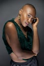 Black Female Fashion Model with Bald Hairstyle Looking Confident and Bold Royalty Free Stock Photo