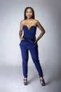 Black Female Fashion Model Wearing Blue Pants